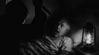 A lantern illuminating the moment of the fatal blow
