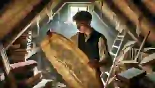 Hans discovers an old map in the attic, hinting at a lost village in the forest.